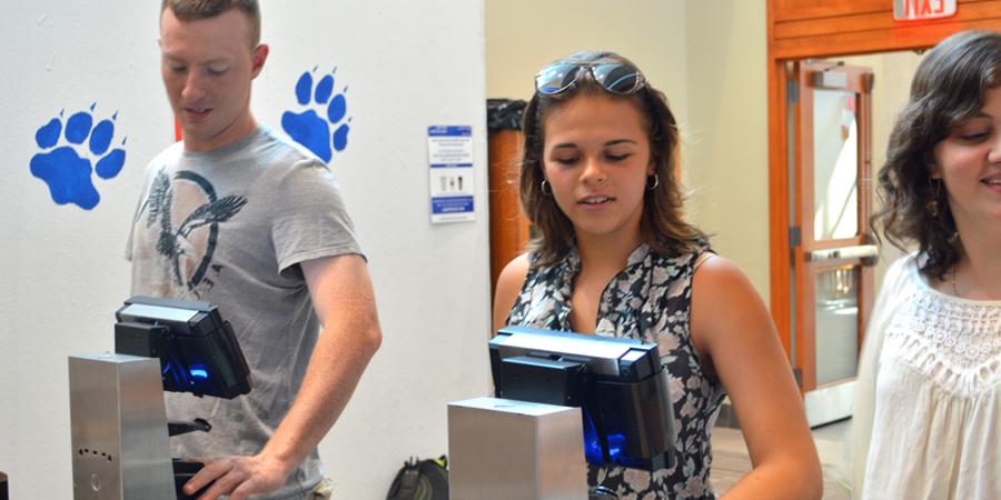 Students Scanning Fingers at Dining Hall